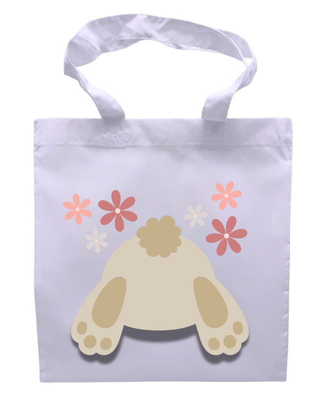 White tote bag with a bunny paw print and flowers on a white background