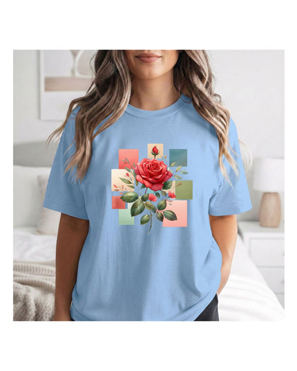 a light blue t-shirt with a floral design 