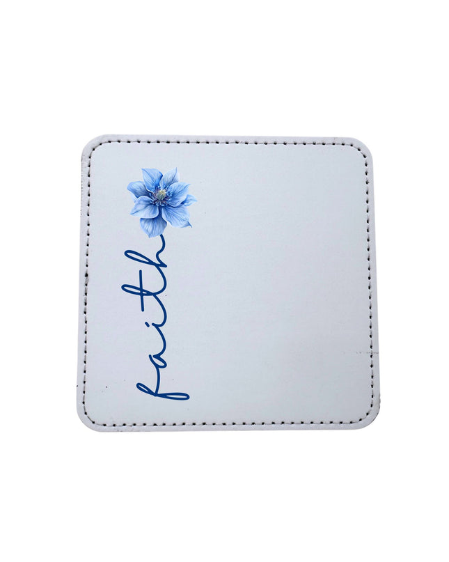Square white coaster with blue flower and 'faith' text on a white background
