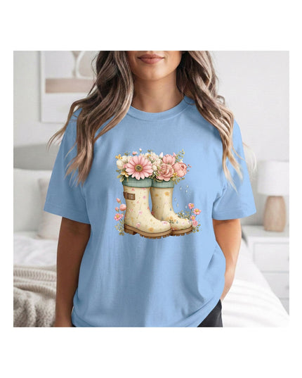 Light blue t-shirt with floral and boot design.