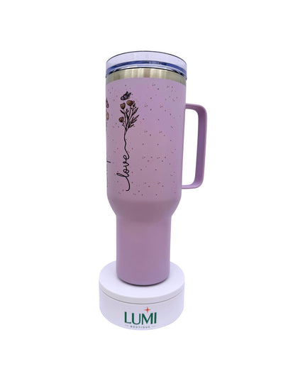 Purple tumbler with floral design and 'Lumi' branding on a white background