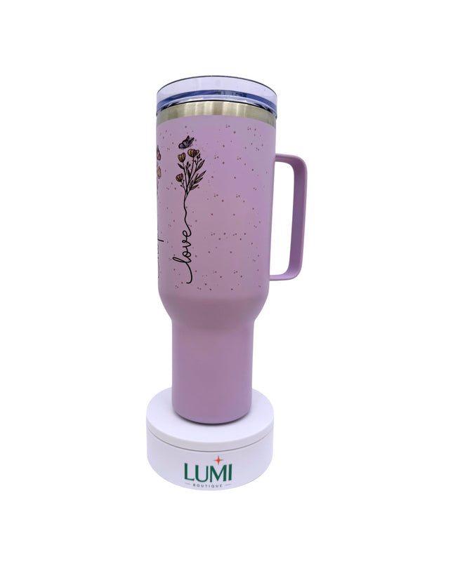 Purple tumbler with floral design and 'Lumi' branding on a white background