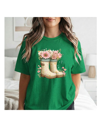 Green t-shirt with floral and boot design.