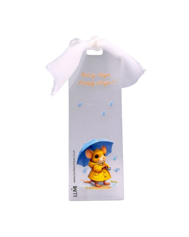 Packaged product with a cartoon mouse in a raincoat holding an umbrella on a white background