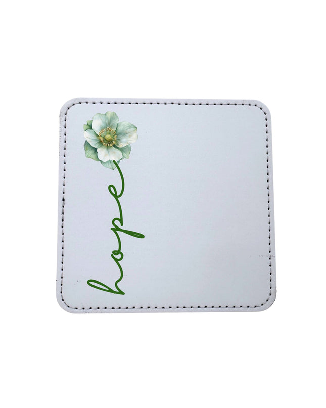 Coaster with floral design and 'hope' text on a light blue background