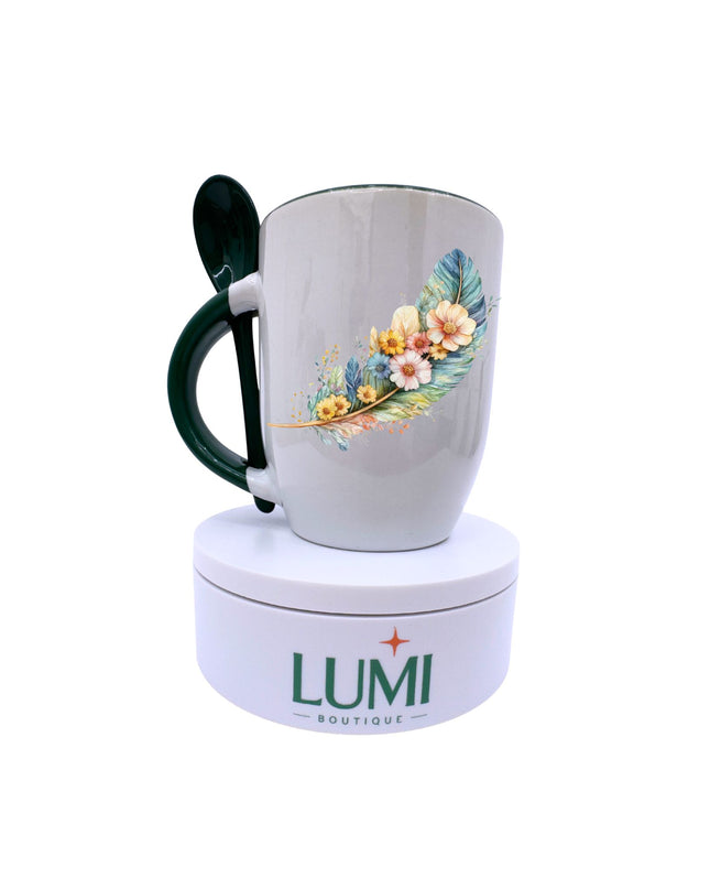 Mug with floral design on a white background, featuring the LUMI Boutique logo.
