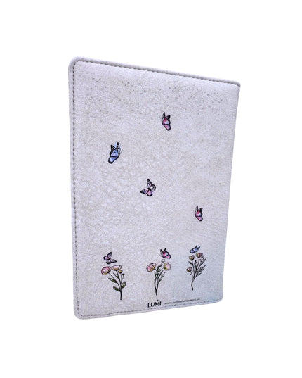 Felt product with embroidered butterflies and flowers on a white background