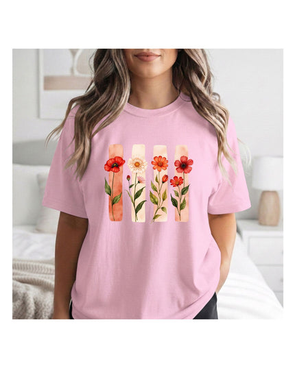  a pink t-shirt with floral designs 
