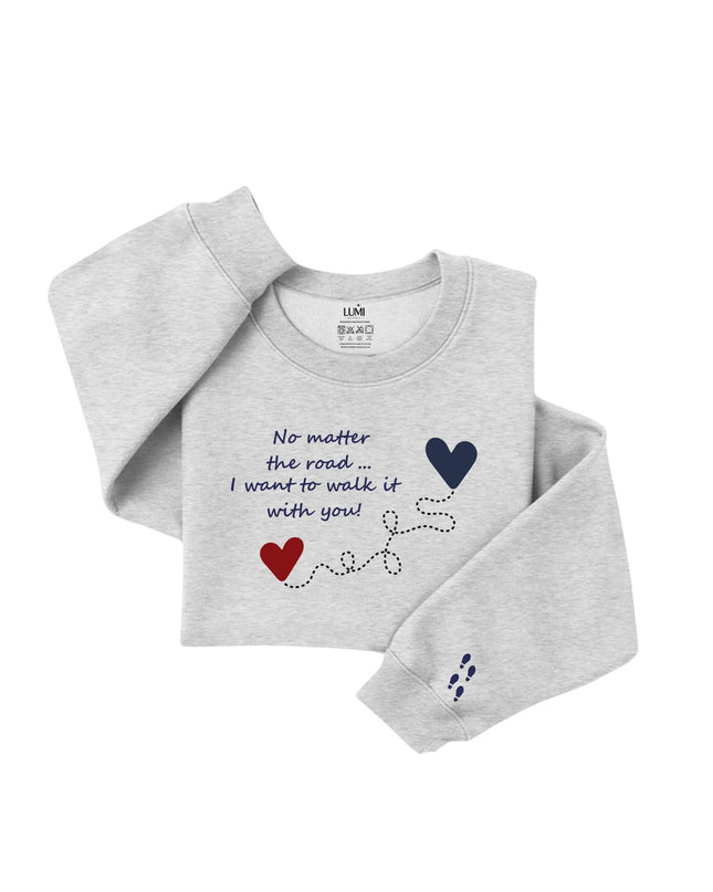 Gray sweatshirt with text and heart designs 