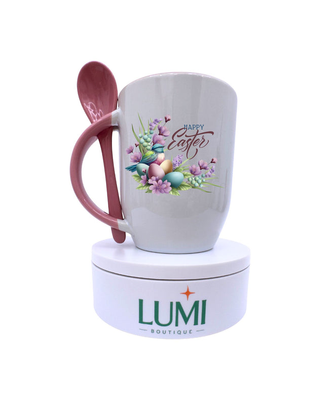 Easter-themed mug with pink handle and floral design, featuring LUMI Boutique branding.