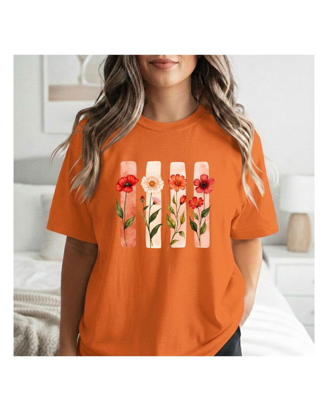 an orange t-shirt with floral design 