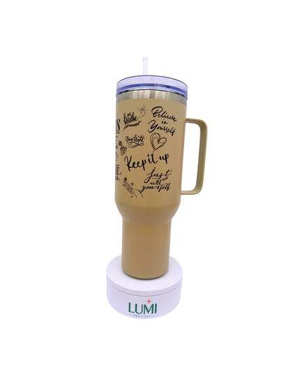 Beige tumbler with motivational text on a white background, featuring the LUMI brand.