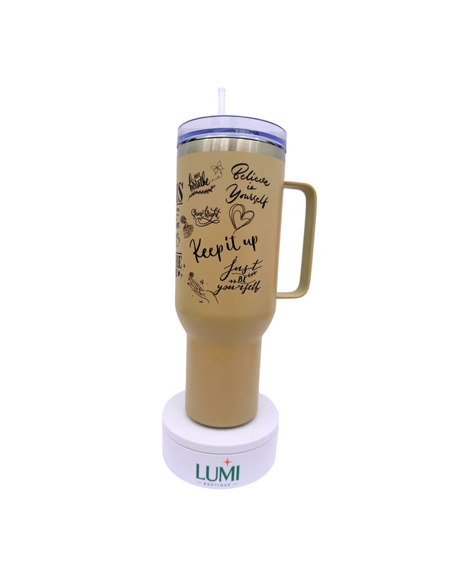 Beige tumbler with motivational text on a white background, featuring the LUMI brand.