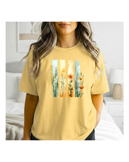  a yellow t-shirt with a floral design.