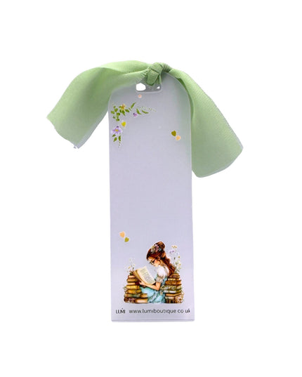 Product packaging with a green ribbon on a white background