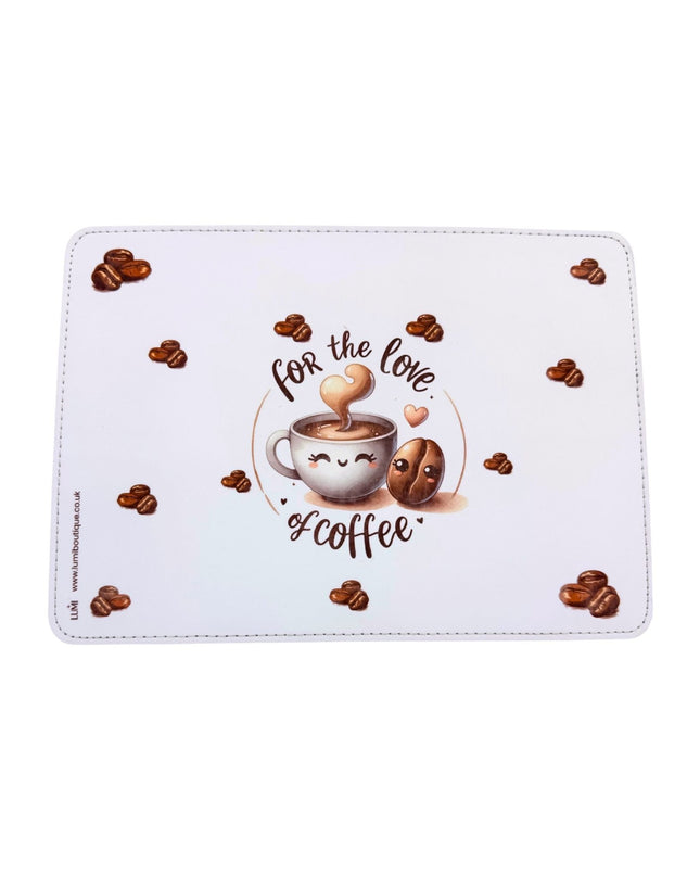 Rectangular white mat with coffee-themed design featuring a cup and beans on a white background