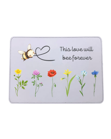 Placemat with floral design and bee illustration on a white background