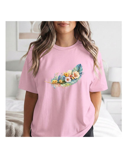  a pink t-shirt with a colorful design and text 