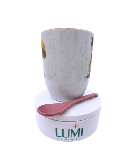 Ceramic mug with colorful design on a white background, featuring the LUMI brand.