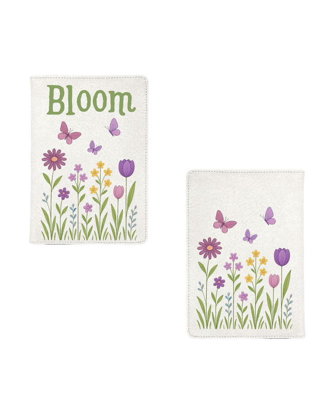 Two decorative towels with floral designs and the word 'Bloom' on a white background.