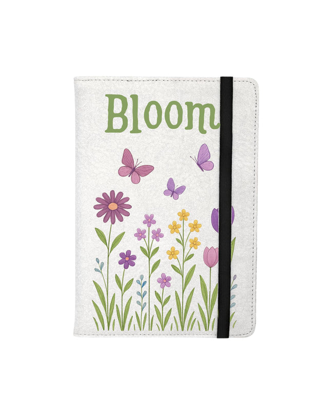 Notebook with floral design and 'Bloom' text on a white background