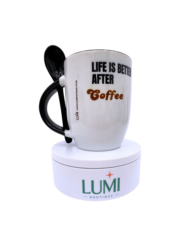 White mug with black handle and text 'Life is better after Coffee' on a white background, featuring the Lumi Boutique logo.