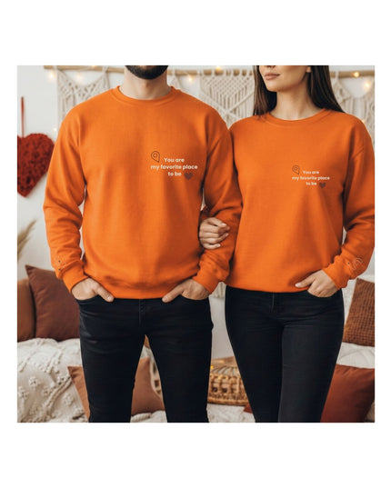  orange sweatshirts with text 
