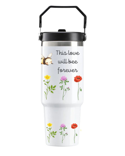 White tumbler with floral designs and text on a white background
