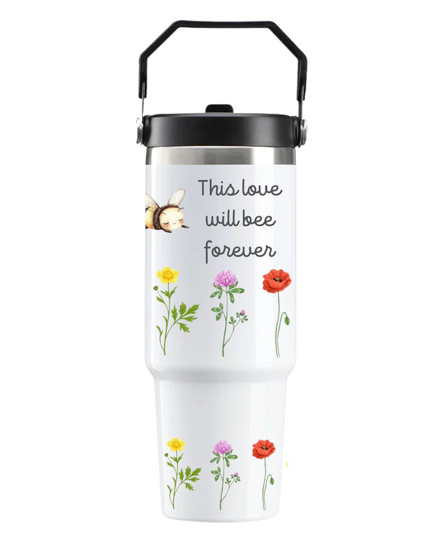 White tumbler with floral designs and text on a white background