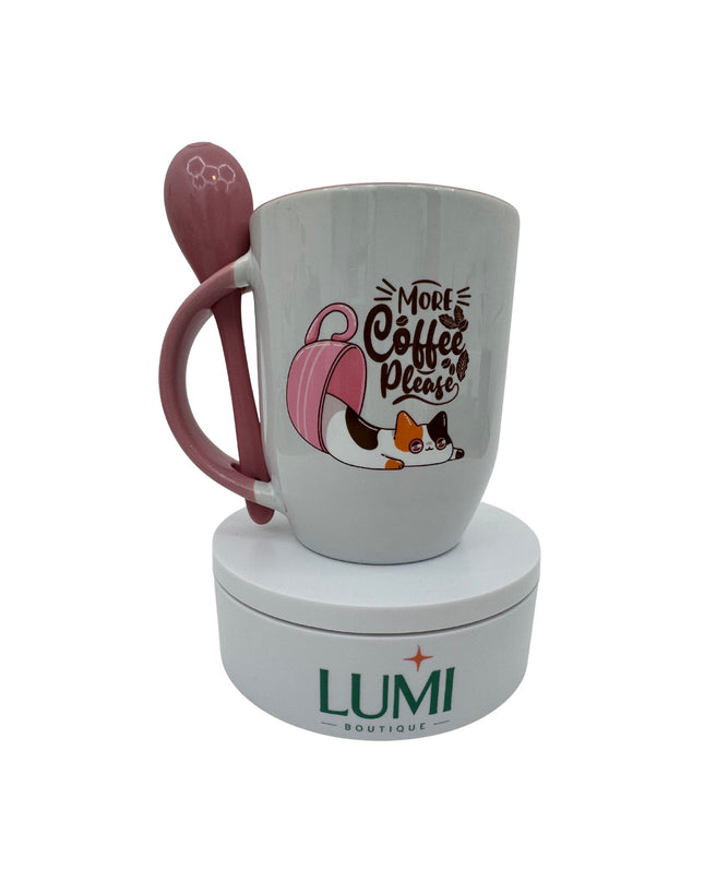 Gray mug with pink handle and spoon, featuring a cat design and text, on a white base with LUMI branding.