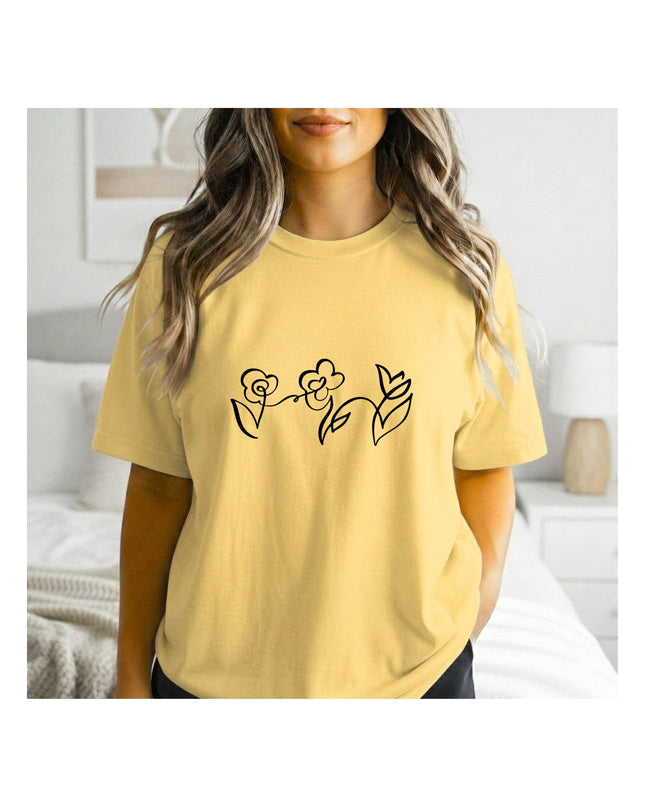 a yellow t-shirt with floral designs 