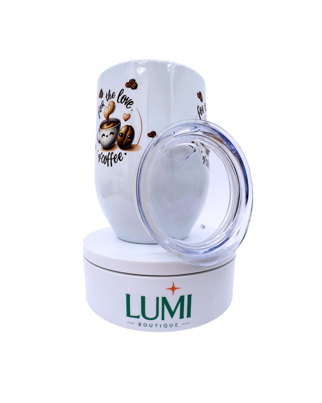 White mug with coffee-themed design on a white background, featuring the brand 'LUMI Boutique'.