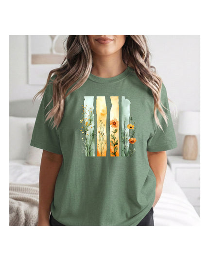 a green t-shirt with a floral design.