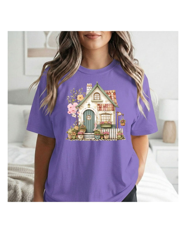  a purple t-shirt with a house graphic