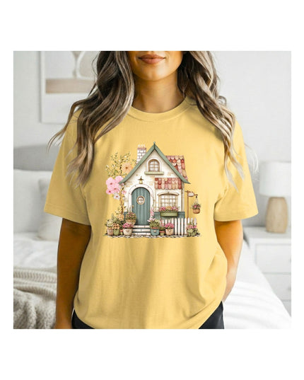 a yellow t-shirt with a house graphic 