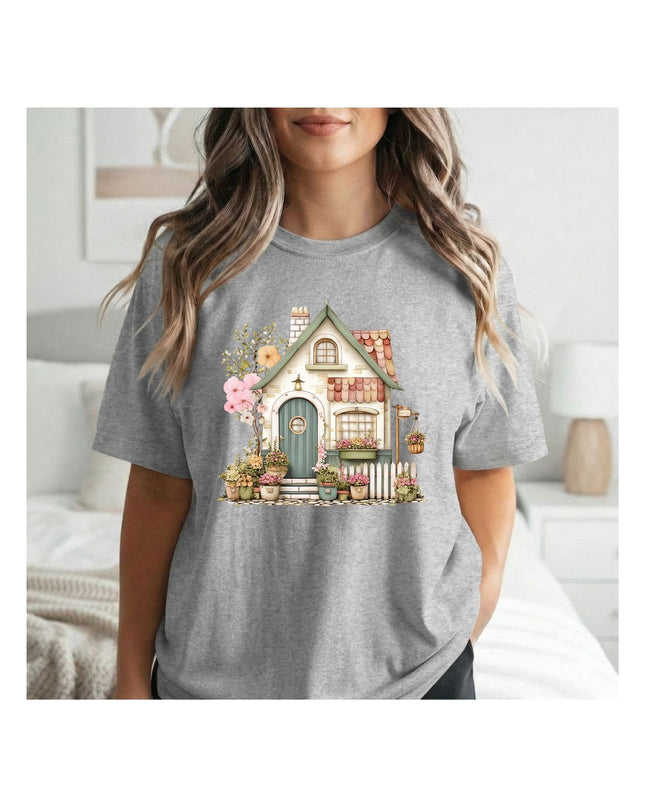 a gray t-shirt with a house and flower design 