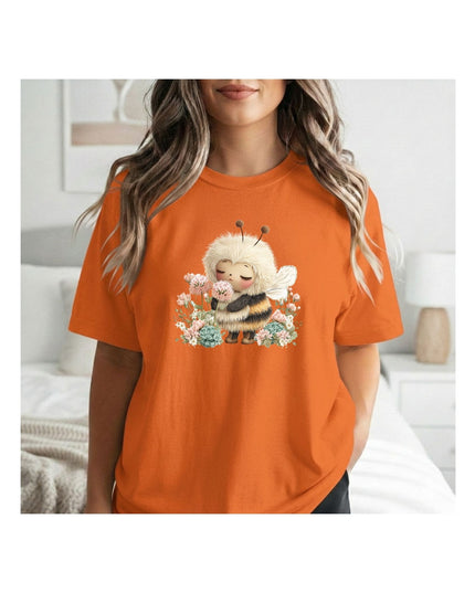 an orange t-shirt with a cartoon bee design