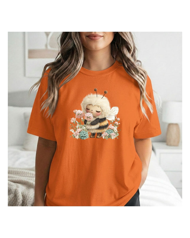 an orange t-shirt with a cartoon bee design