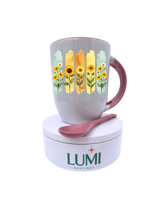 Mug with floral design, spoon, and LUMI container on a white background