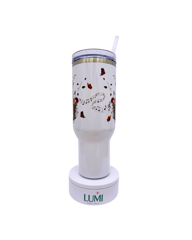 White tumbler with musical design and LUMI logo on a white background