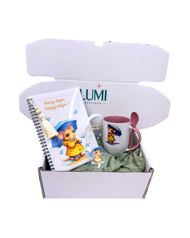 Gift box with mug, notebook, and plush toy from Lumi Boutique on a white background