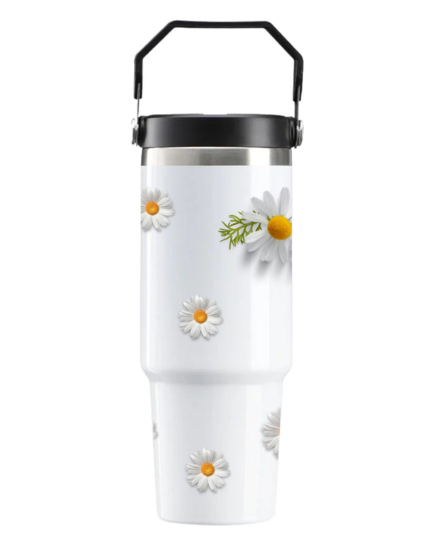 White tumbler with daisy flower designs on a white background