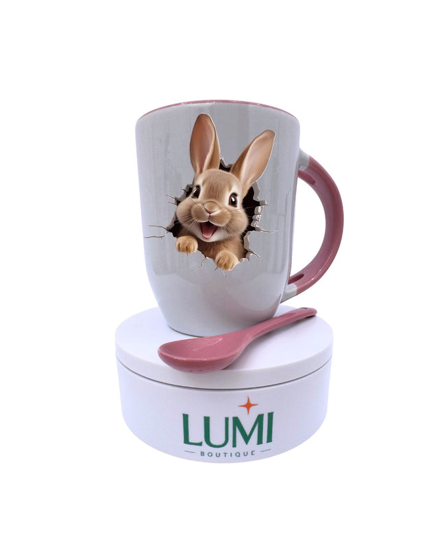 Mug with rabbit design, spoon, and LUMI Boutique container on a white background