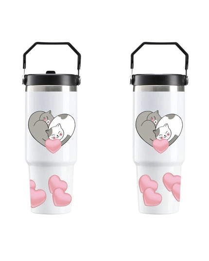 Two white tumblers with black lids featuring cartoon cats and pink hearts on a white background.