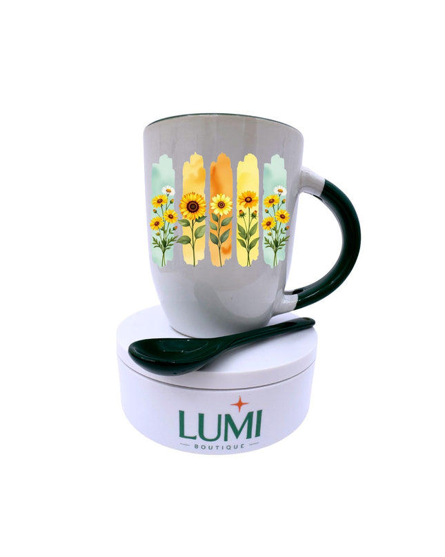 Mug with floral design and matching spoon on a white background, featuring the LUMI Boutique brand.