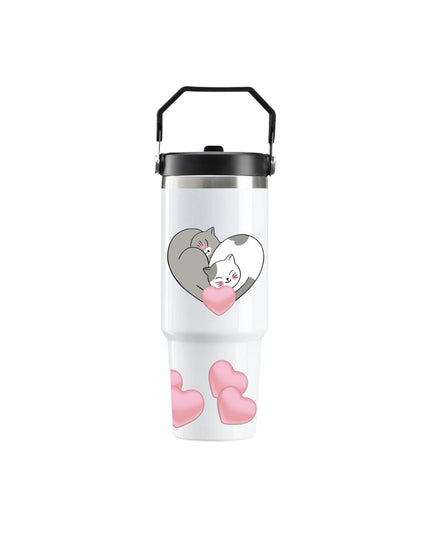 Tumbler with cartoon cats and hearts design on a white background