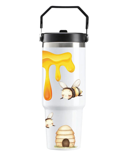 Tumbler with bee and honey design on a white background
