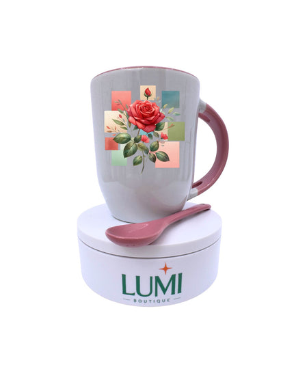 Mug with floral design, spoon, and LUMI Boutique container on a white background