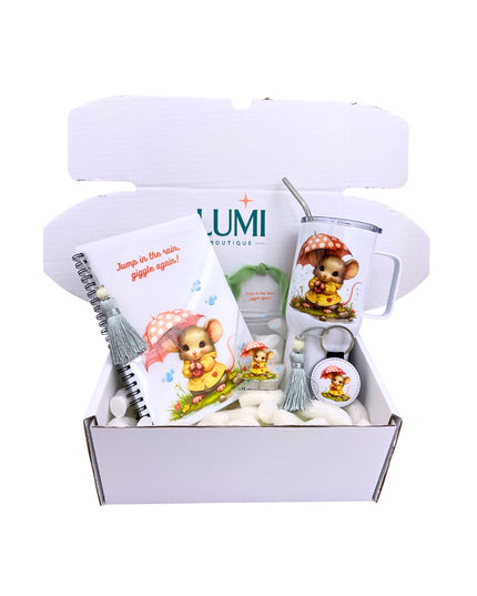 Gift set with notebook, mug, and keychain featuring a bear design in a white box.