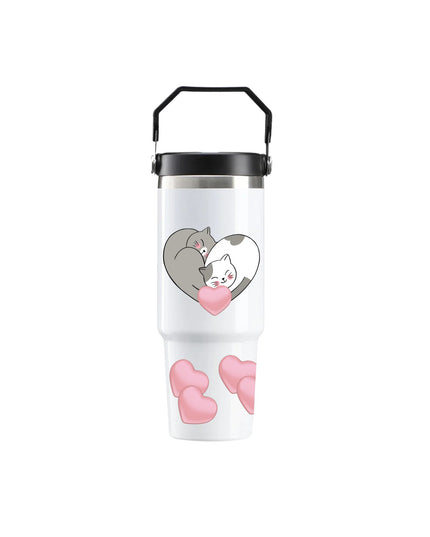 Tumbler with cartoon cats and hearts design on a white background